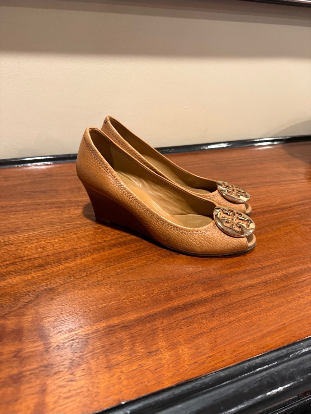 Tory Burch Camel Leather Peep-Toe Wedge Pumps with Logo Medallion